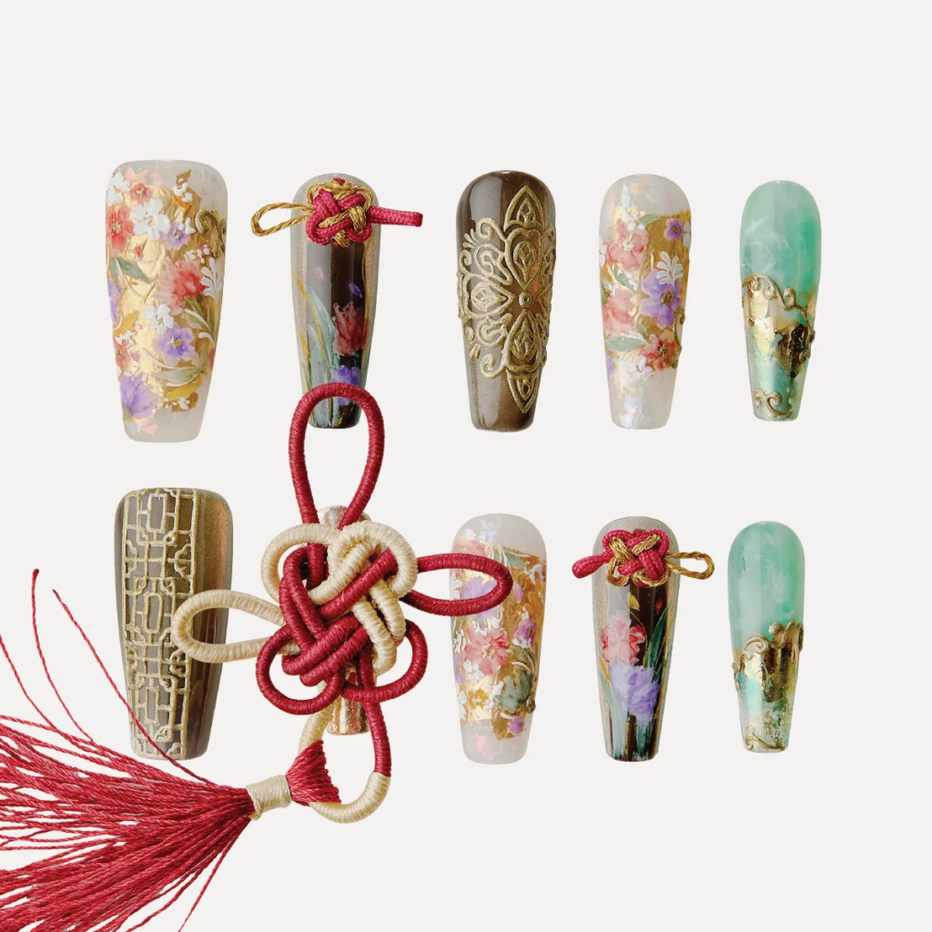Haipai Elegance press-on nails with hand-painted florals, metallic detailing, and vintage Shanghai-inspired motifs