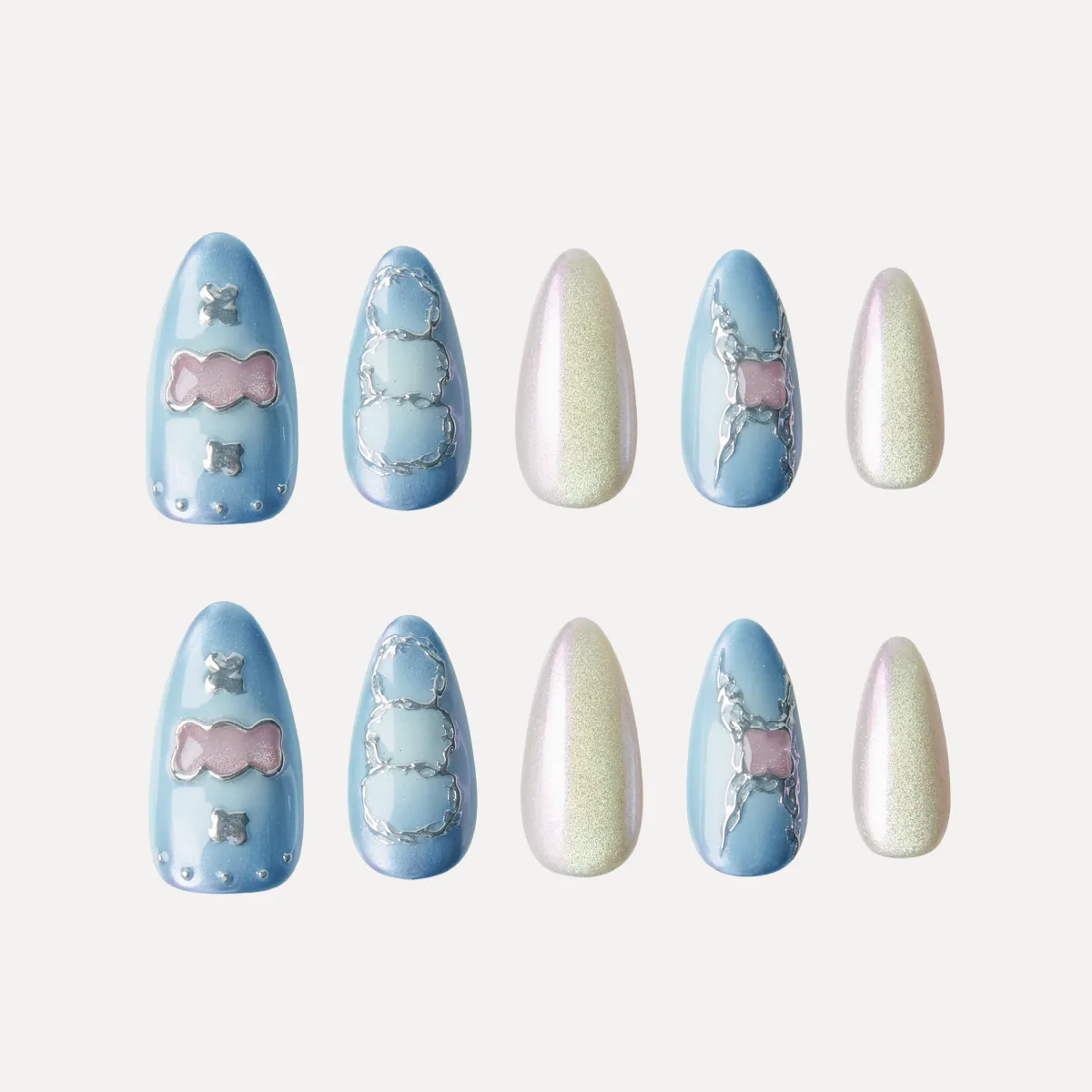 Medium almond press-on nail set in blue gradient and pearl shimmer with candy and outline motifs.