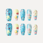 Candy Night long coffin press-on nail set with blue glitter, pastel yellow, abstract shapes, and LOVE soda-bottle motif.