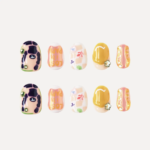 Flat lay of 10 short round press-on nails with colorful patternds