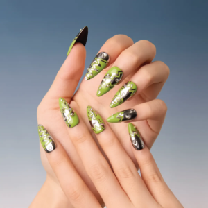 Double-hand pose showing edgy metallic green stiletto press-on nails with 3D rhinestones