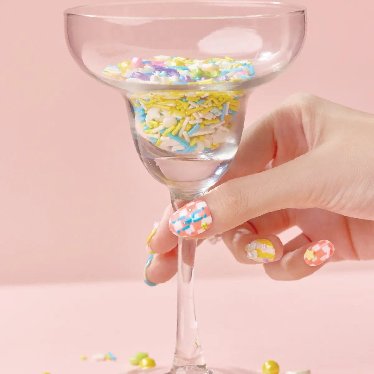 Close-up of LOST in PARK Sweet Dream Bomb nails with vibrant designs and 3D embellishments.