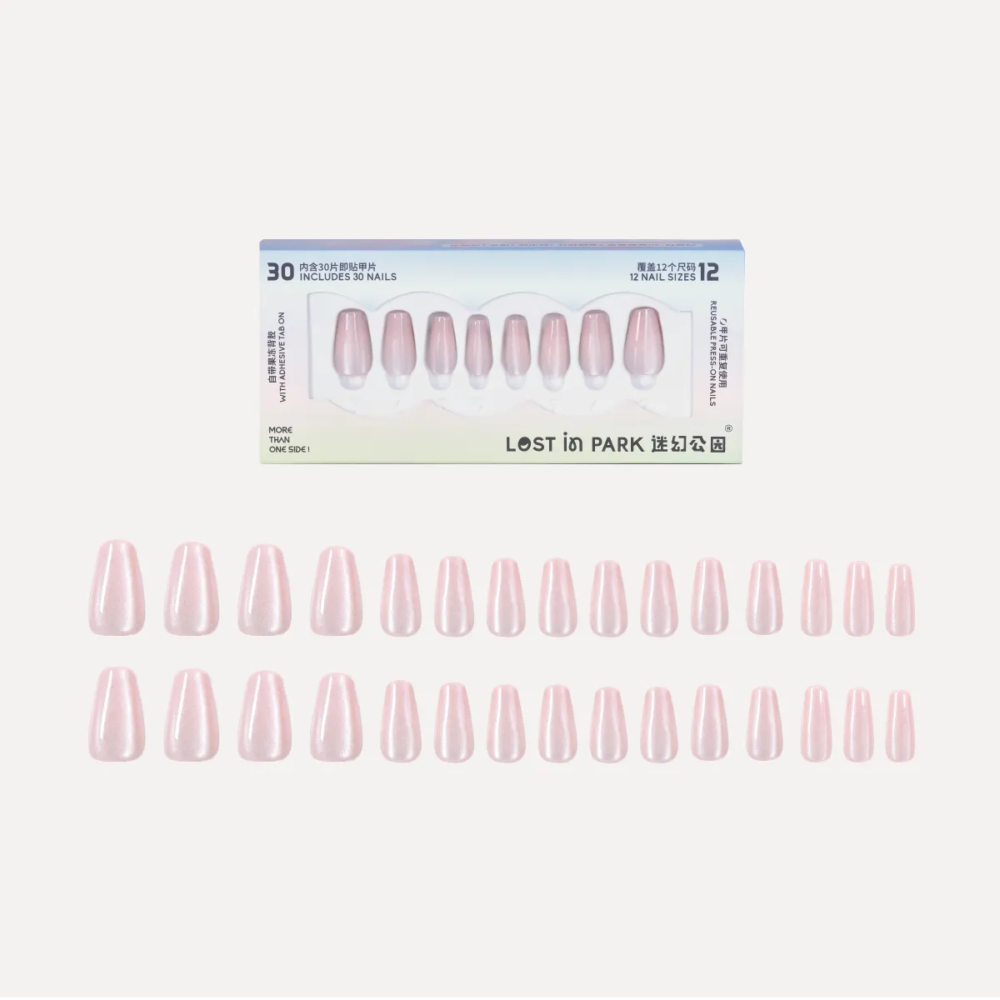 Full box and layout of LOST in PARK Pearl Glass press-on nails, showing 30 pieces in various sizes with pearly pink cat eye finish