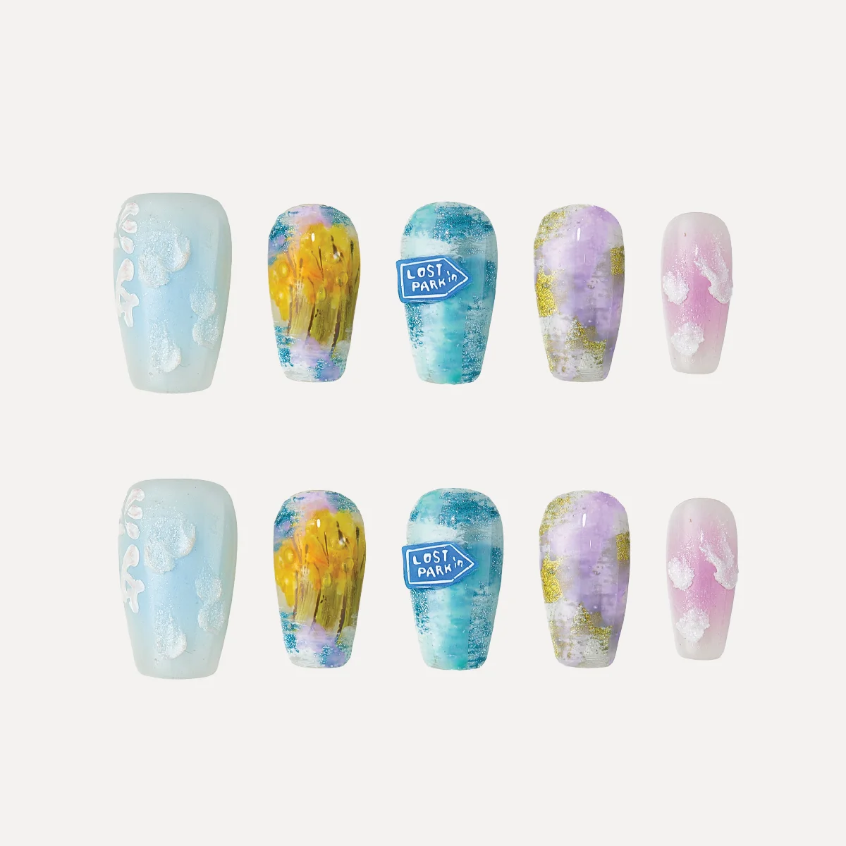 Medium coffin press-on nail set with abstract pastel designs arranged individually on white background