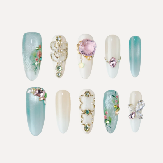 Minty Glaze long oval press on nails set with mint green and pearl designs