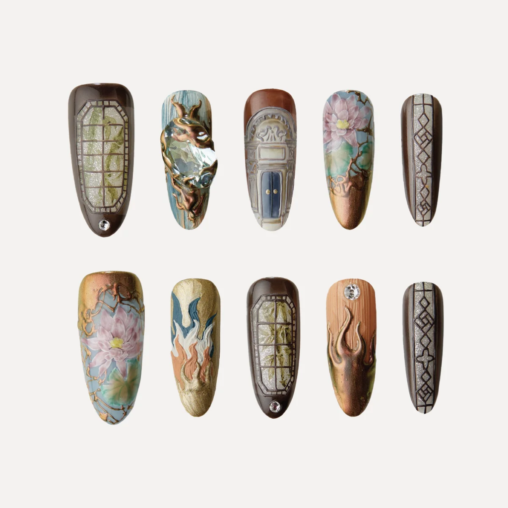 Shadows of Stone press-on nails inspired by architectural textures, gemstone accents, and earthy tones