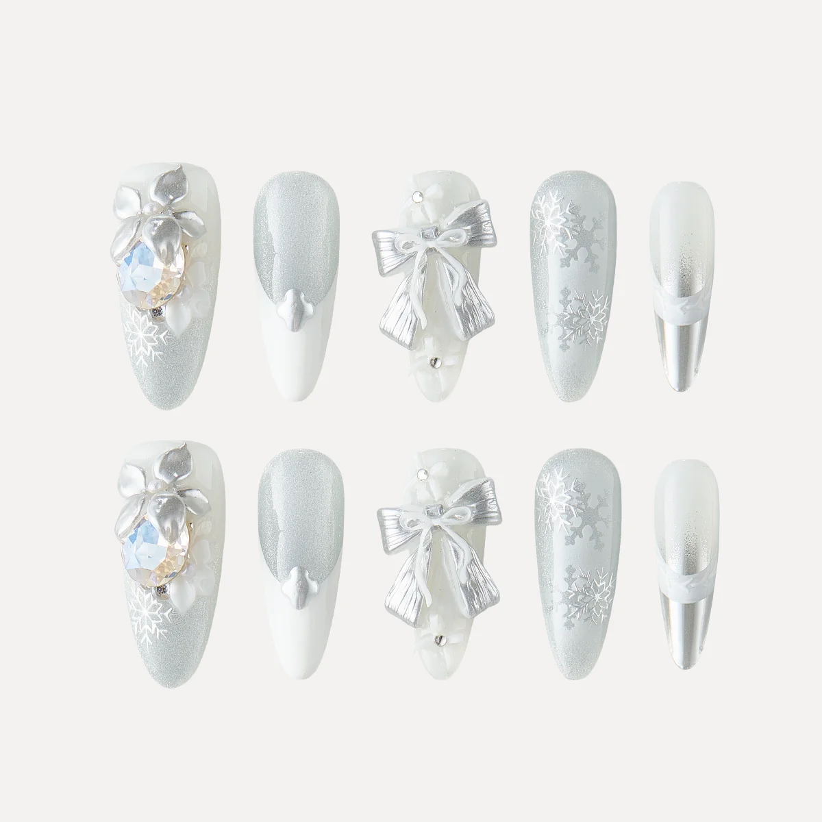 Snowy Nocturne long almond press on nail set with silver white bow and snowflake design