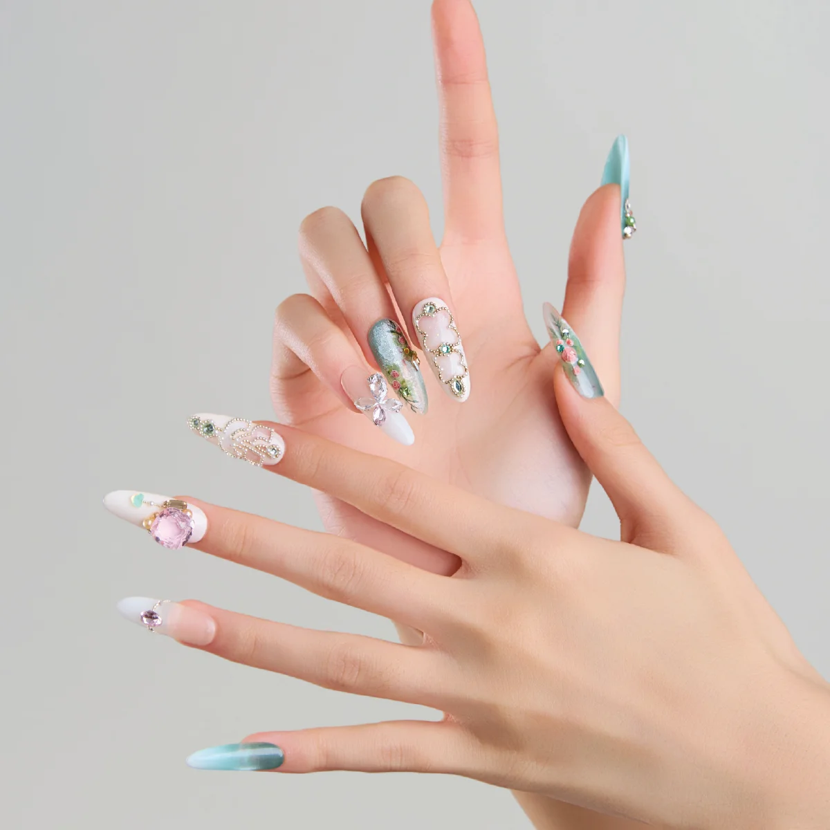 Minty Glaze long oval press on nails side view with gemstone details