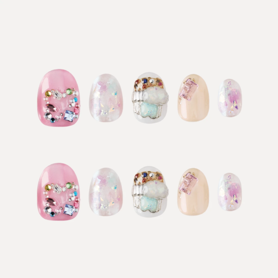 Sweet Charm Box short round press on nails set with pastel colors and crystal designs