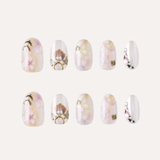 Short oval press on nail design set with floral and pearl details
